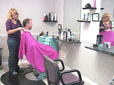 Client being styled at Rita's
